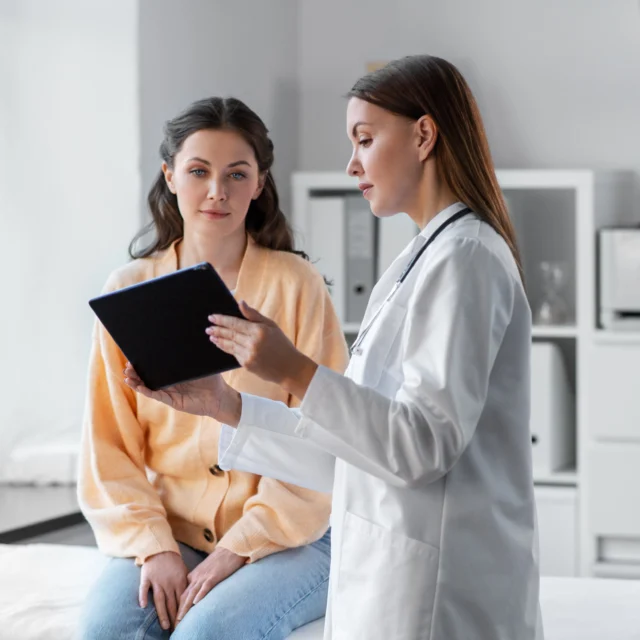 A doctor reviewing a weight loss plan with a patient.